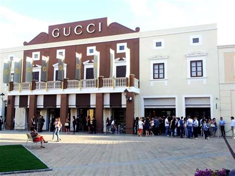 gucci negozi puglia|puglia outlet centre.